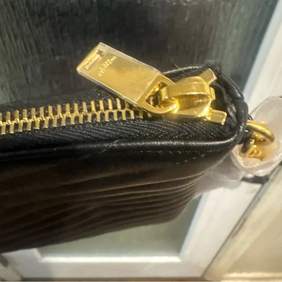 Yves Saint Laurent Black Sizable Clutch with detachable wristlet with gold YSL. - Picture 9 of 16